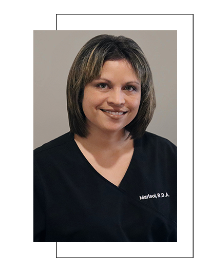 The image shows a woman with dark hair wearing a black shirt, posing for a professional headshot.